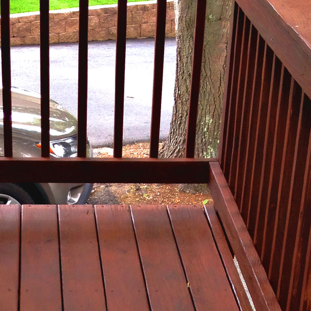 Exterior deck professionally stained and restored in Wakefield, MA